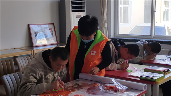 爱的路上不放弃任何一个残疾人
