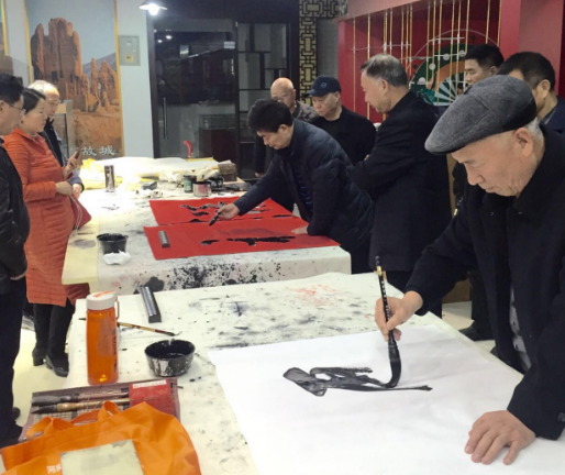 河南豫达集团举办纪念改革开放40周年书画展暨企业文化融合研讨会